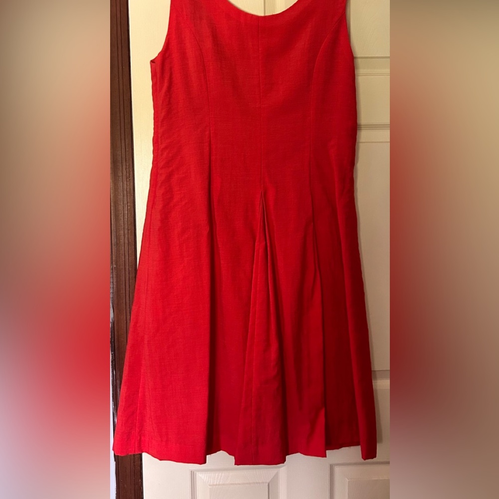Women’s  reddish / orange color dress flair style